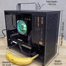 Ultra portable gaming PC size comparison with banana for scale - 22cm tall, 12cm wide, 19.5cm deep