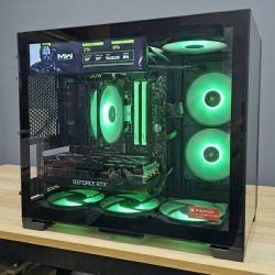 Black gaming PC build with green RGB fans, RTX 3070 Ti, Ryzen 5 5600X, Gigabyte B550 Aorus, Call of Duty on display panel
