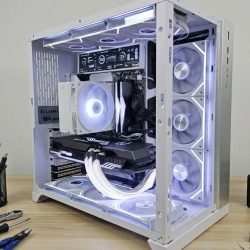Custom gaming PC build in Lian Li case with Zotac RTX 3070 Ti Ryzen 5 5600X white RGB fans angled view